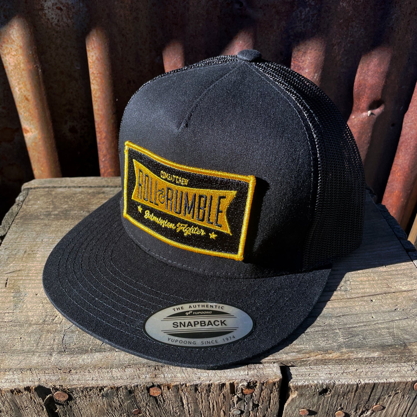 ROLL & RUMBLE Combat Crew Submission Fighter Hat (black on black with gold & black patch) by ROLL & RUMBLE Fight Co.