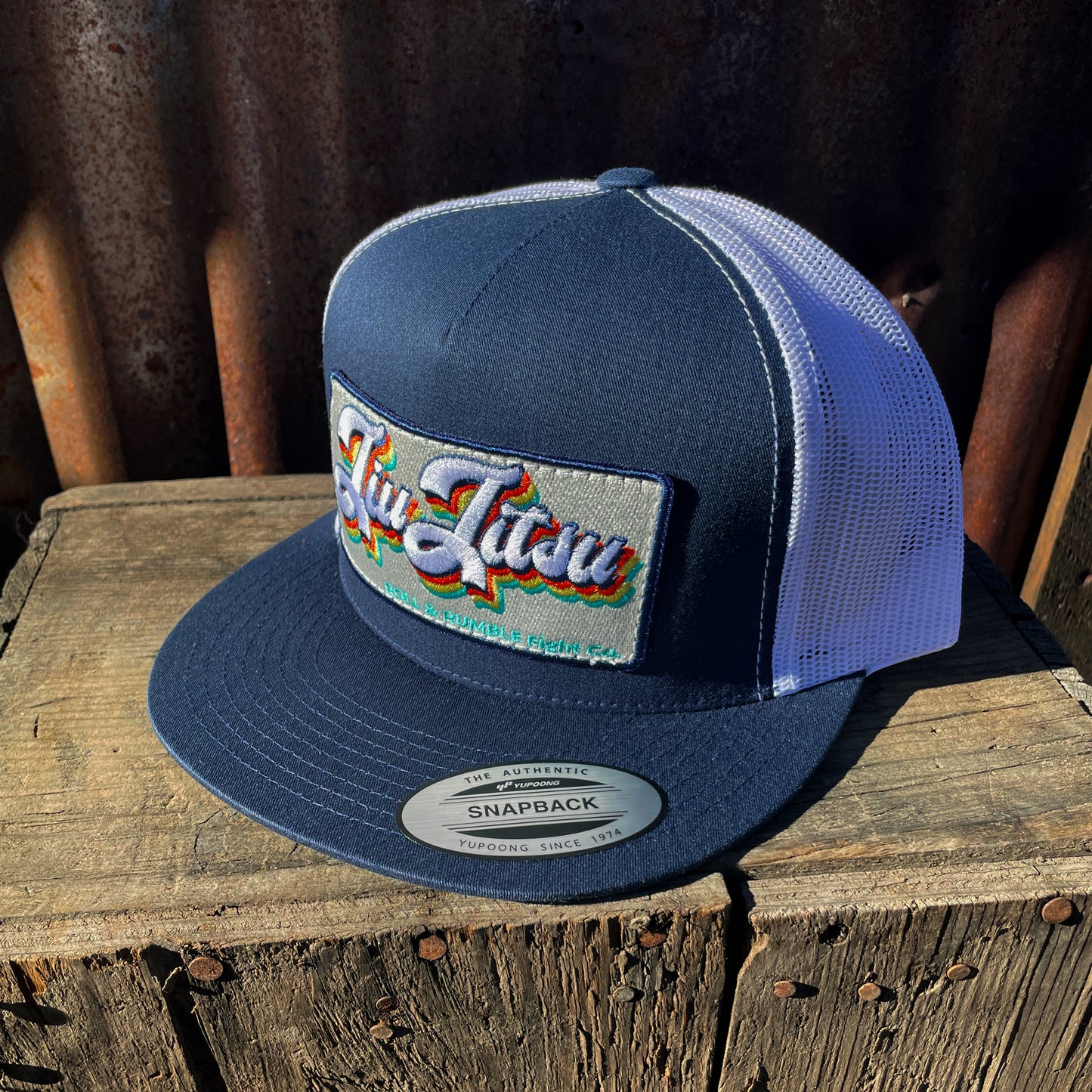 Retro Jiu-Jitsu Hat (blue on white with retro patch) by ROLL & RUMBLE Fight Co.